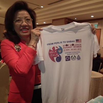 Siew Yong holding the Conference T shire 